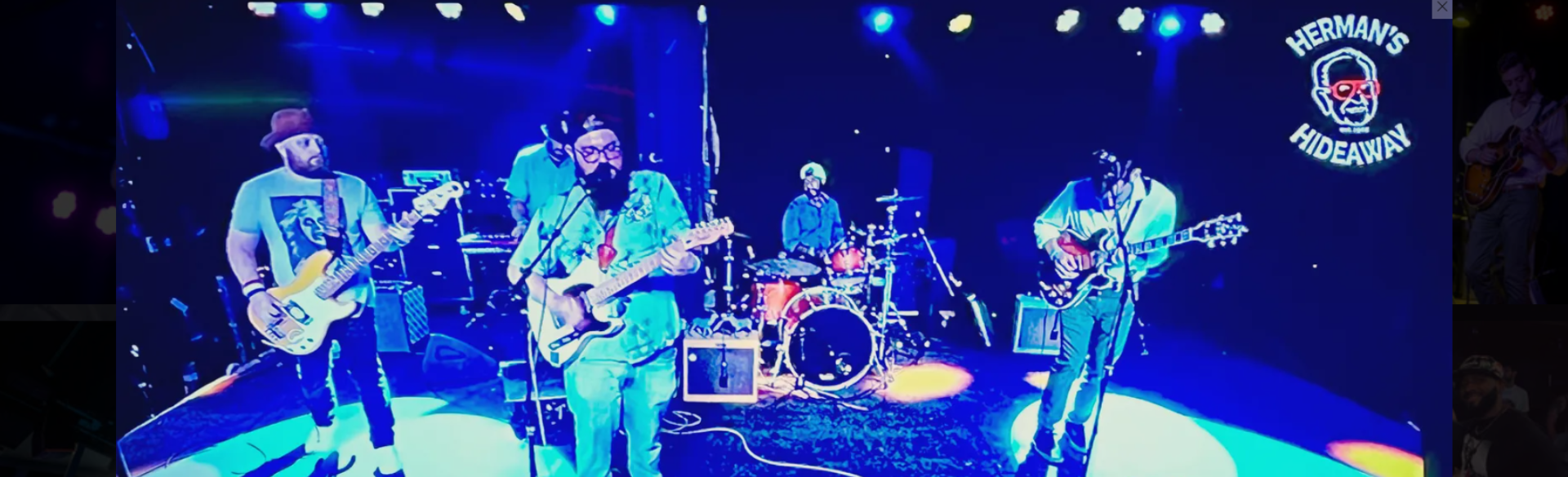 Band members on stage.
