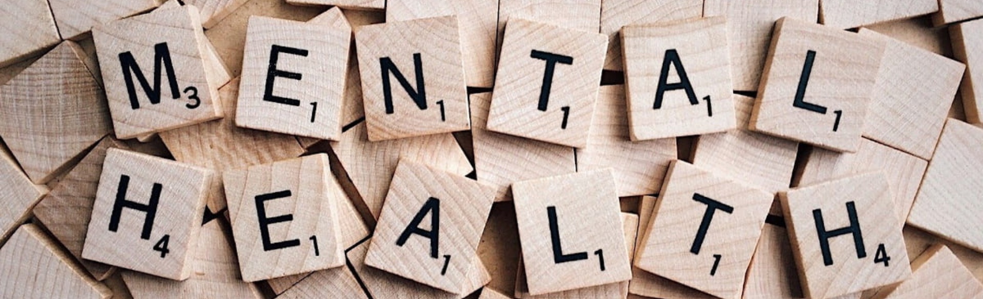 Mental health spelled out in Scrabble tiles